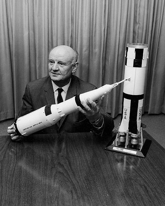 The notorious Arthur Rudolph with a model of the Saturn V.