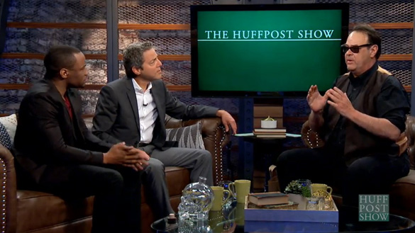 Dan Aykroyd talks about UFOs and cover-ups on The Huffington Post's The HuffPost Show. A bottle of his Crystal Head Vodka can be seen on the coffee table. (Credit: The Huffington Post)