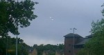 Two UFOs photographed from pub near London