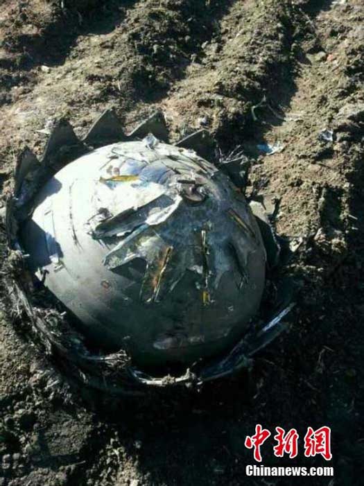 Closer image of the strange object that crashed into a man's vegetable garden in Heilongjiang, China. (Credit: Chinanews.com)