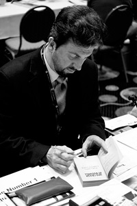 Don Schmitt signing books at the 2011 International UFO Congress. (image credit: Peter Beste)