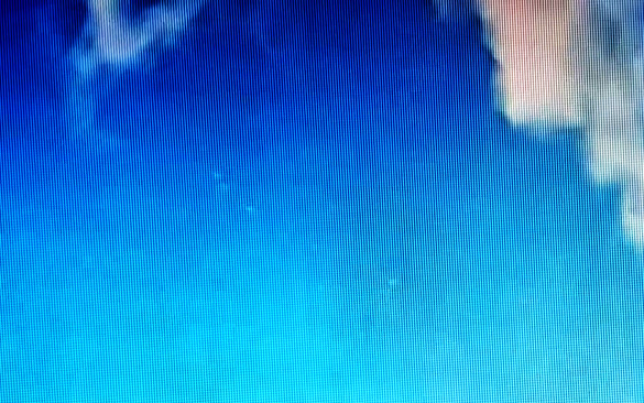 Enhanced still frame from the video showing several of the white orb UFOs near the clouds. (Credit: YouTube/Daniel Neamtu/M.Cazares)