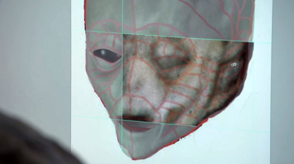 A scene from the documentary showing the alien face while it is being transformed into a computer rendering. (Credit: Slidebox Media)