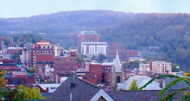 Normally quiet West Virginia has four new cases of low flying UFOs in October alone. Five other cases this year have been closed as Unknowns. Pictured: Morgantown, West Virginia. (Credit: Wikimedia Commons)