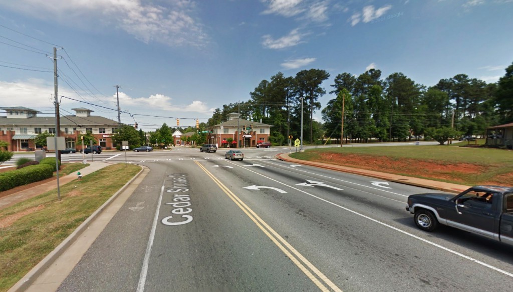 The Athens, GA, witness was driving northwest along Cedar Shoals Drive and stopped at a red light at the intersection of Barnett Shoals Road and Gaines School Road, pictured, when the triangle-shaped UFO was seen about 200 feet above the intersection. (Credit: Google)