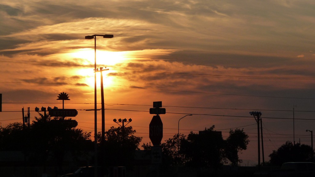 The witness and a passenger ruled out known objects and believe they saw a UFO. Pictured: Sunset at the Sonic Drive-In, Deming. (Credit: Wikimedia Commons)