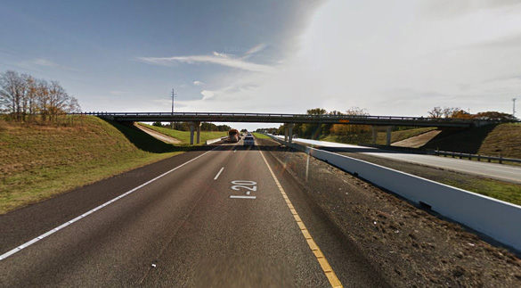 The witness noticed the triangle-shaped object hovering over a bridge just off I-20. Pictured: A bridge over I-20 in Lindale, TX. (Credit: Google)