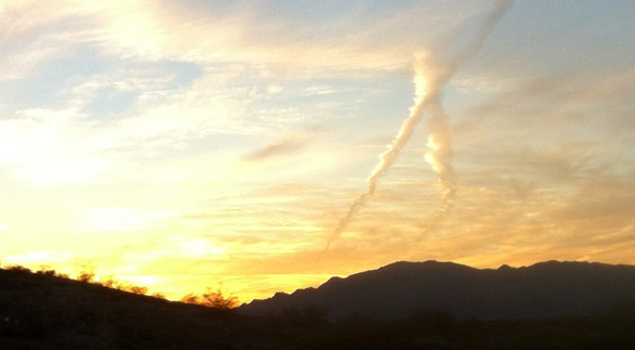 Contrail over the Arizona desert. (Credit: Alejandro Rojas)