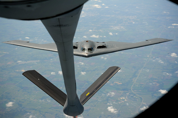 A B-2 Spirit from Whiteman Air Force Base recedes from the boom of a KC-135 Stratotanker assigned to the 22nd Air Refueling Wing McConnell Air Force Base . (Credit: U.S. Air Force/Airman 1st Class John Linzmeier)