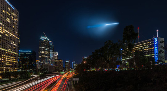 A Trident missile the Navy tested off Los Angeles Saturday night is shown from the Fourth Street bridge over 110 Freeway in Los Angeles. Photographer Preston Newman was on a photo shoot at the time. (Credit: Preston Newman Photography, on Instagram at @Newman_Photos/The San Diego Union-Tribune)