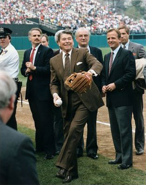 Reagan throws outthe openning pitch at a Chicago Cubs baseball game. Uberroth is in front to his left. (image credit: Reagan Library)