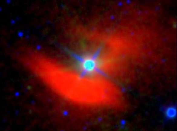 A false-color image of the mid-infrared nebula surrounding the nearby star 48 Librae. This nebula was discovered in the course of the G-HAT survey using Nasa's WISE space telescope. The nebula is invisible in most kinds of light, including visible light. (Credit: Roger Griffth (Penn State) / IPAC (NASA/JPL-Caltech))