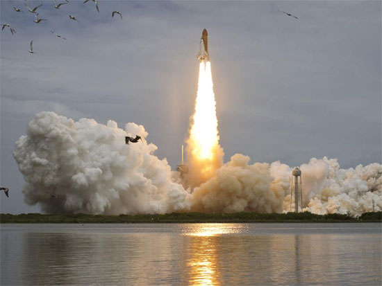 Space shuttle Atlantis blasting off for the final time (credit: NASA/Bill Ingalls)