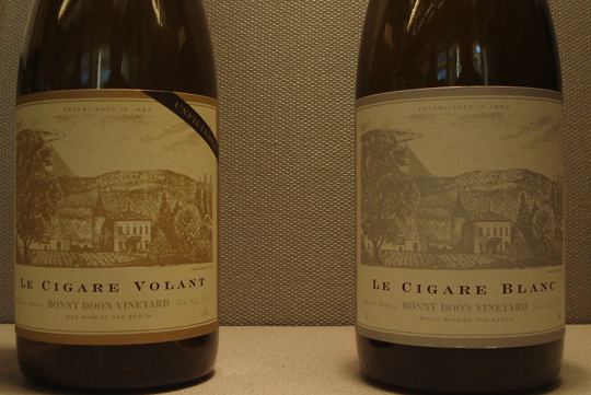 Le Cigare Volant and Le Cigar Blanc bottles (empty).