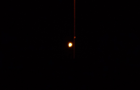 Picture of flare behind light pole from May 3, 2011. (image credit: Alejandro Rojas)