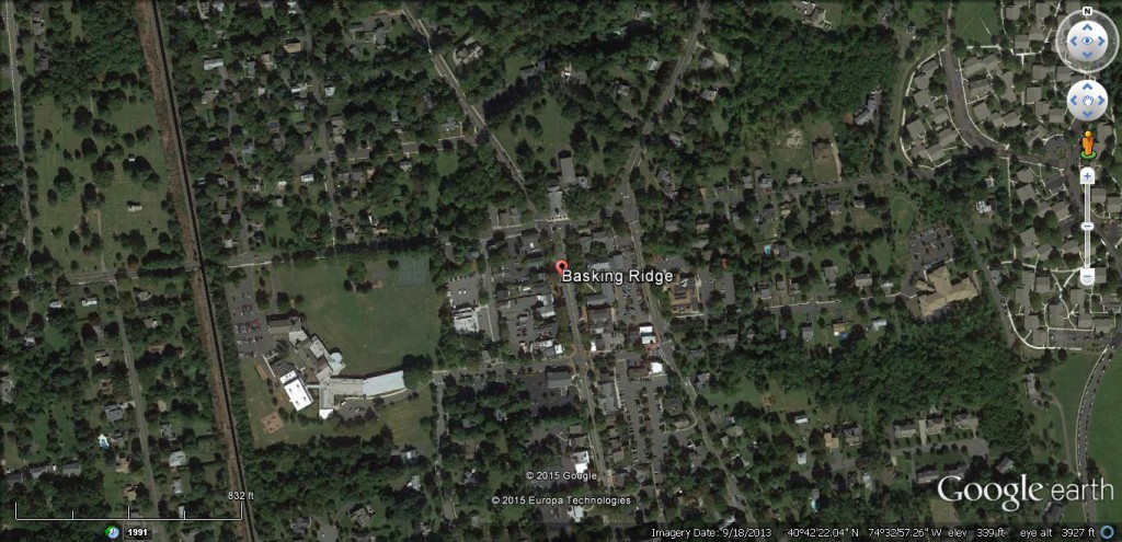 The witness first observed a very large, black triangular object with flashing red, white and blue lights moving over the Basking Ridge, NJ, area. (Credit: Google)