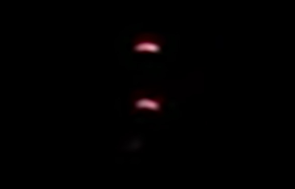 The Mesa, AZ, witness watched the two lights positioned vertically from each other for more than 15 minutes. Pictured: Cropped and enlarged photo from the witness video. (Credit: MUFON)