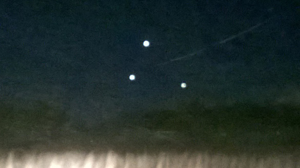 Witness photo of three orbs. (Credit: MUFON)