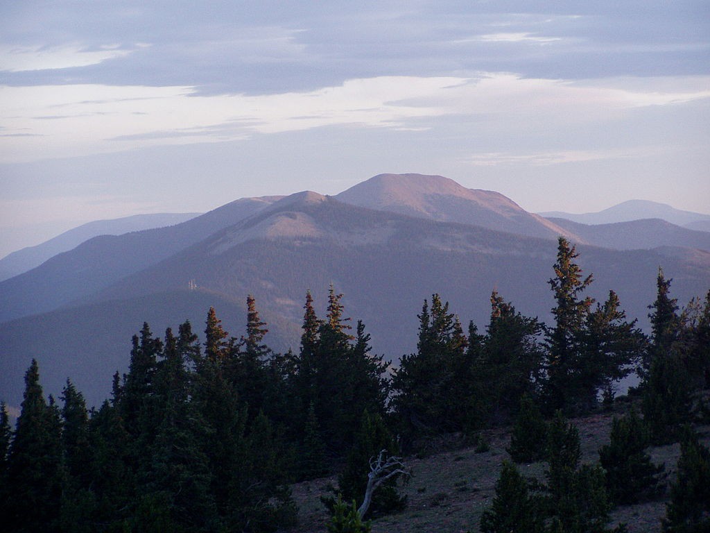 The witness described the object as a round, flat object, about the diameter of a car tire. Pictured: Mount Baldy, from the peak of Mount Phillips. (Credit: Wikimedia Commons)