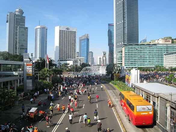 The object seemed to change shape during the sighting and eventually changed directions and moved slowly away from the witness. Pictured: Jakarta pedestrians, joggers and bicyclists take over the main avenue during Car-Free Day. (Credit: Wikimedia Commons)
