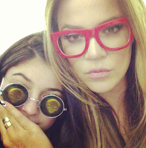 Kylie Jenner wearing alien sunglasses, with Khloe Kardashian. (Credit: Instagram/khloehardashian)