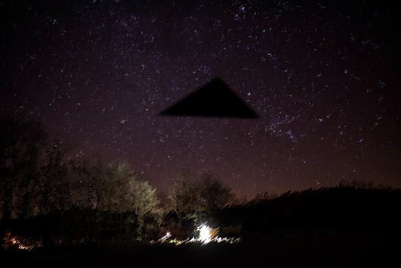 Depiction of triangle UFO at night. (Credit: OpenMinds.tv)